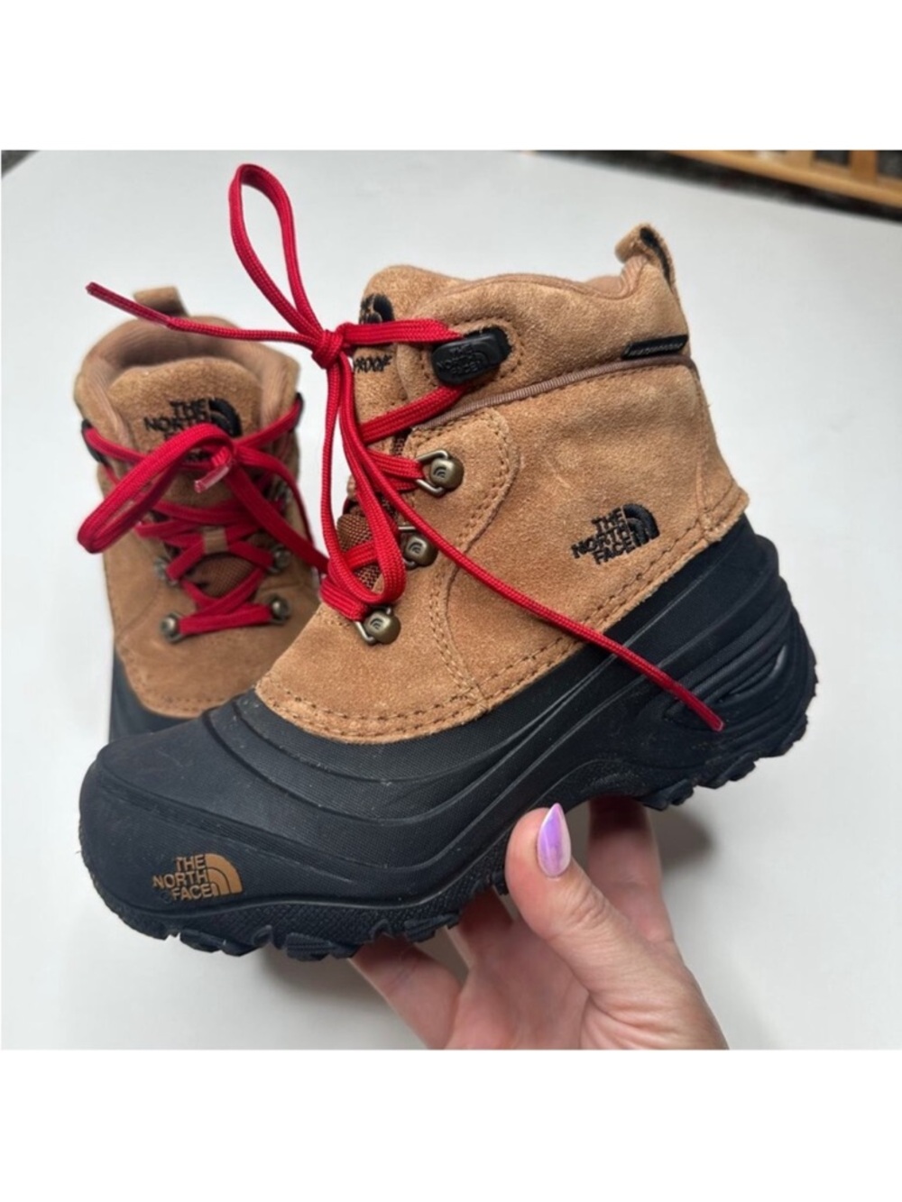 The North Face Kids Chilkat Tan and Black Suede hiking Boots with Red Laces